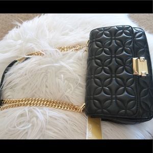 Brand new with tags and come with dust bag as well